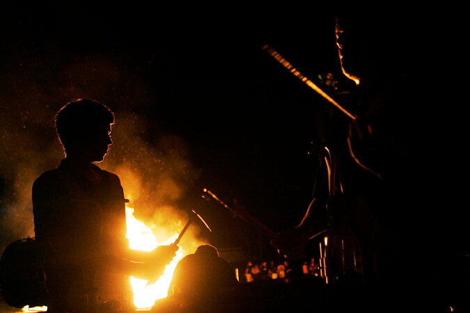 The marching band drummers perform during a homecoming celebration bonfire at Sebastian River High School