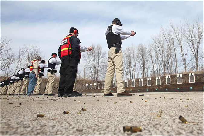 Northwest Indiana Law Enforcement Academy cadets learn how to use a pistol on the outdoor shooting range in Hammond, Tuesday, March 8, 2011.