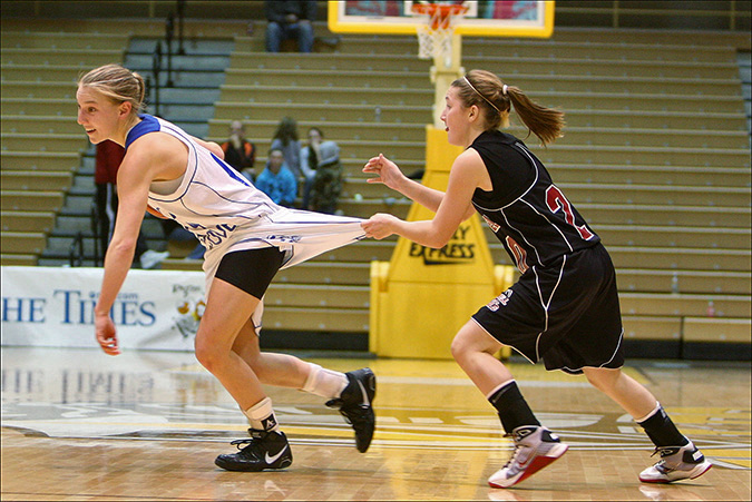 Lowell's Sarah Wieser intentionally fouls Boone Grove's Jordan Chester in the 2011 Region Roundball Rumble at Valparaiso University, Saturday, Jan 1, 2011.