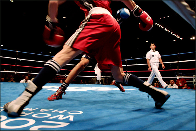 Samir Mammadov of Azerbaijan (red) and Anvar Yunusov of Tajikistan square off in the AIBA world championship at UIC pavilion, Chicago, Oct. 31, 2007.